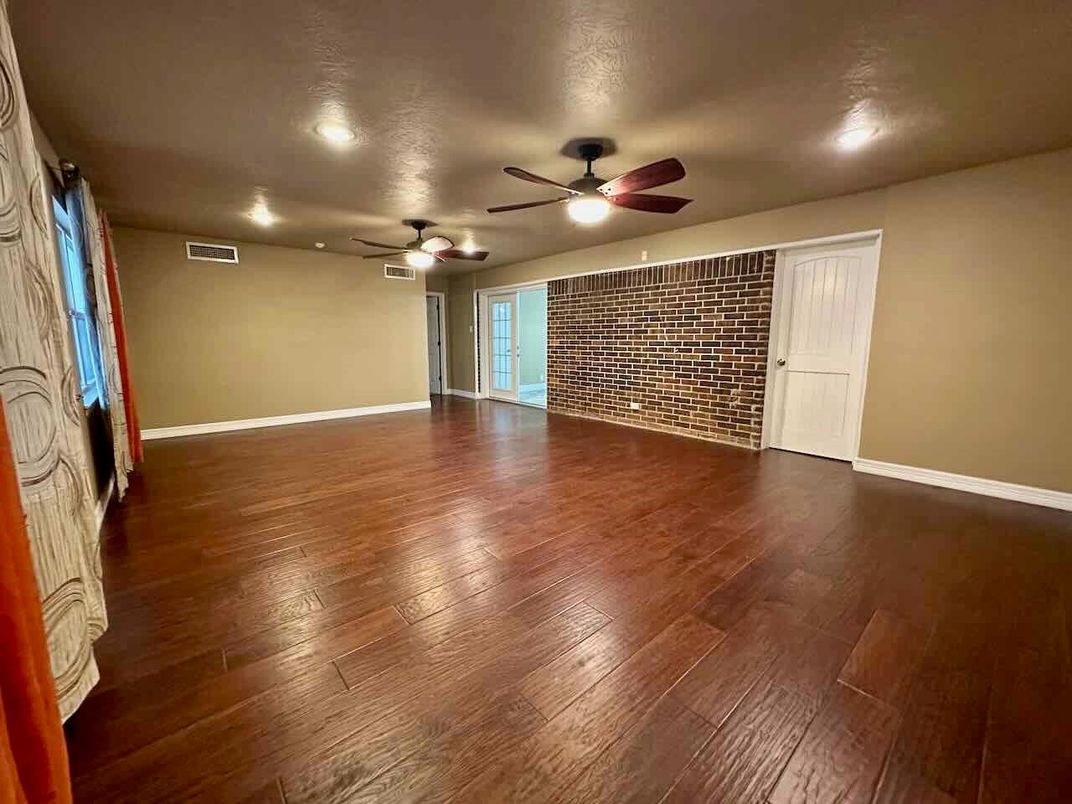 Empty room, Interior, Recessed Lighting, Stone Walls, Wood Texture Flooring