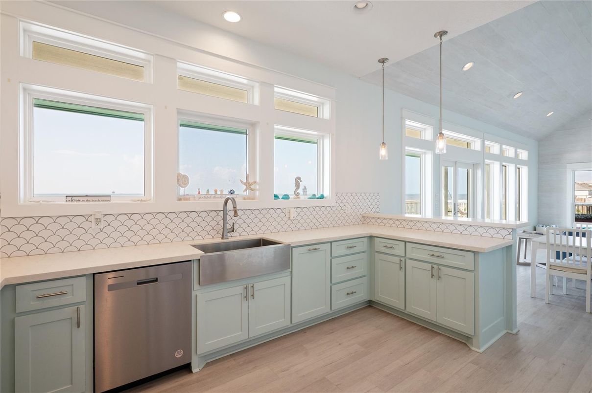 Dining room, Interior, Kitchen, Pendant Lights, Recessed Lighting, Stainless Steel Appliances, Wood Texture Flooring