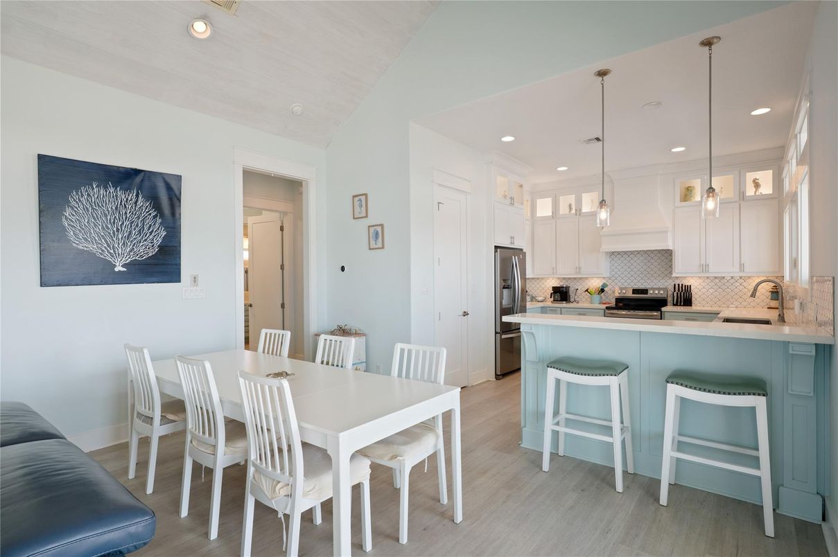 Dining room, Interior, Kitchen, Pendant Lights, Recessed Lighting, Stainless Steel Appliances, Wood Texture Flooring