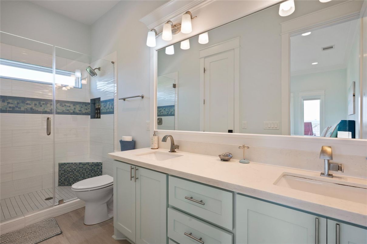 Bathroom, Dual Sink Vanities, Glass Shower, Interior, Recessed Lighting, Wood Texture Flooring