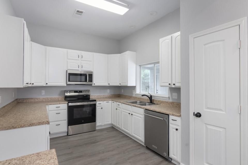 Interior, Kitchen, Recessed Lighting, Stainless Steel Appliances, Wood Texture Flooring