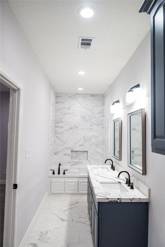 Bathroom, Dual Sink Vanities, Interior, Marble, Marble Walls, Recessed Lighting