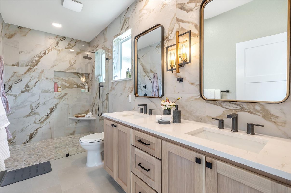 Bathroom, Dual Sink Vanities, Glass Shower, Interior, Marble Walls, Recessed Lighting