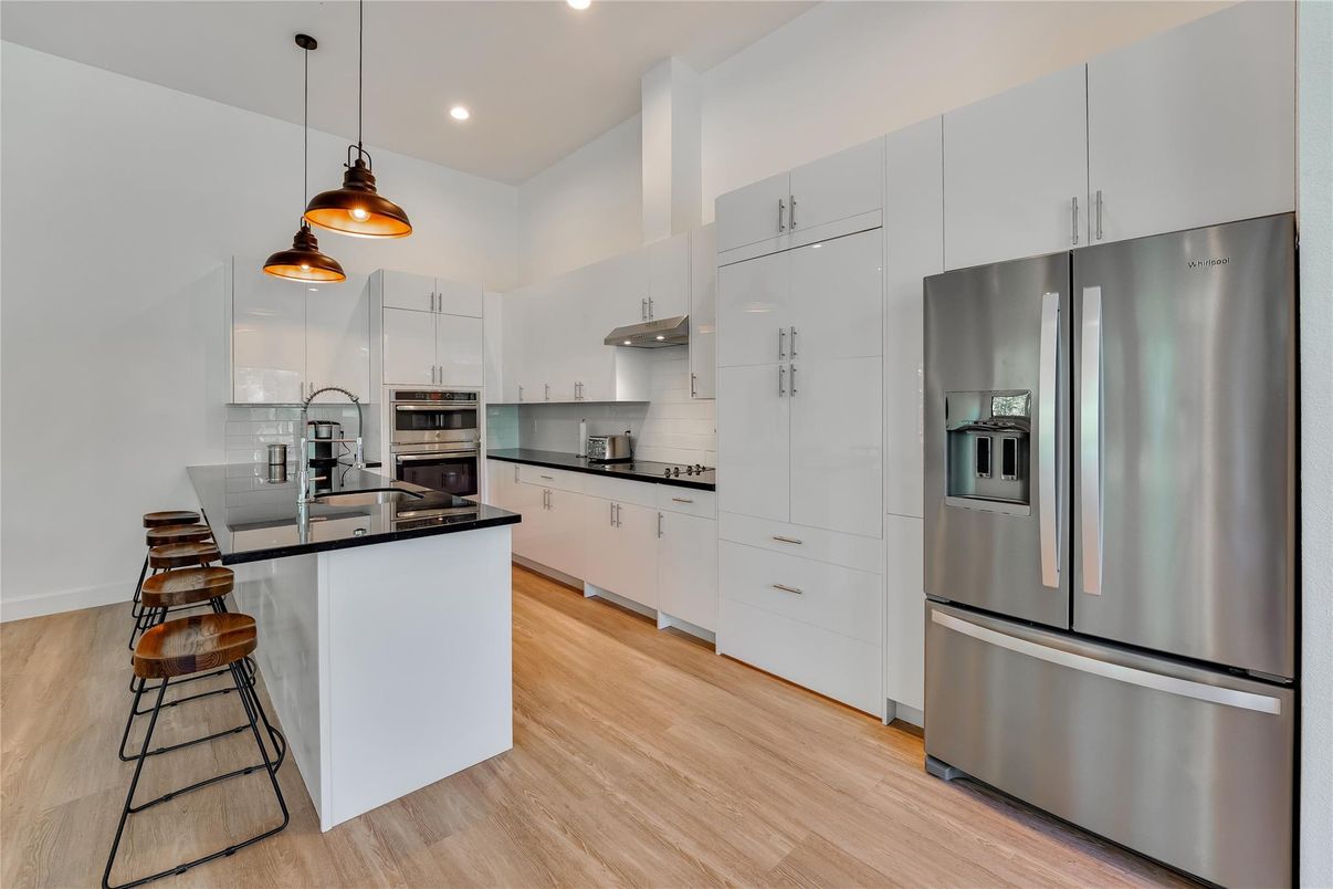 Interior, Kitchen, Pendant Lights, Recessed Lighting, Stainless Steel Appliances, Wood Texture Flooring