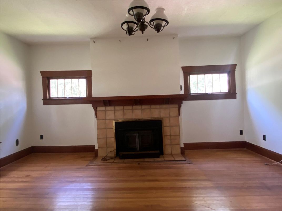 Chandelier, Empty room, Fireplace, Interior, Wood Texture Flooring