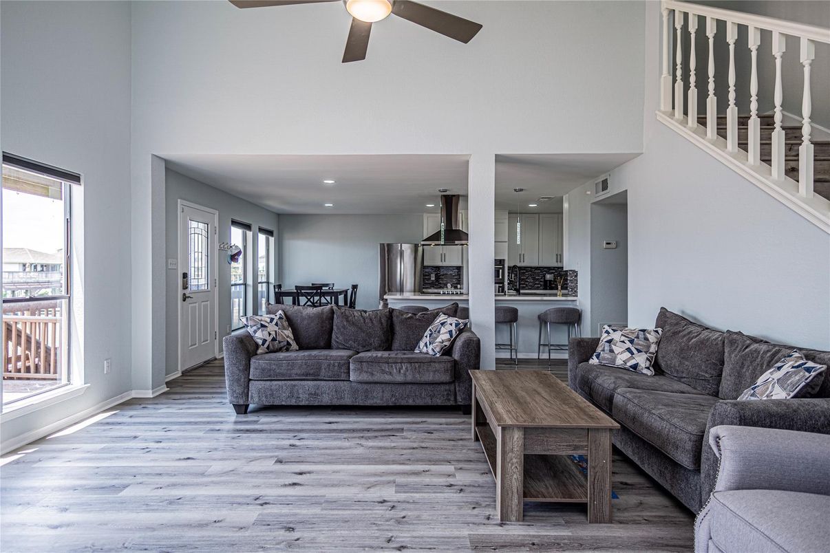 Dining room, Interior, Kitchen, Living room, Recessed Lighting, Stainless Steel Appliances, Wood Texture Flooring