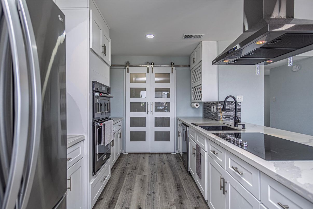 Interior, Kitchen, Recessed Lighting, Stainless Steel Appliances, Wood Texture Flooring