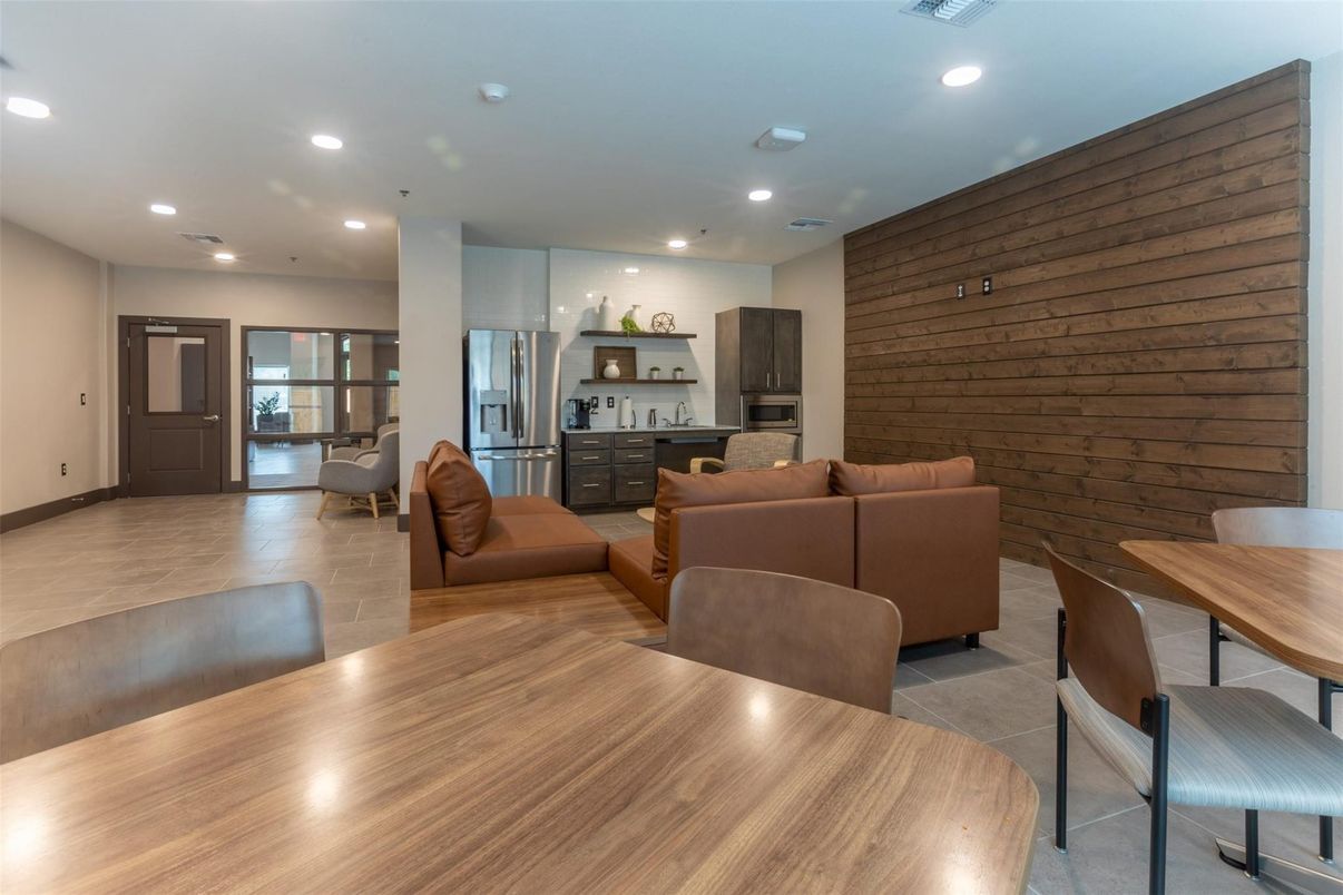 Dining room, Interior, Kitchen, Living room, Recessed Lighting, Stainless Steel Appliances, Wooden Walls