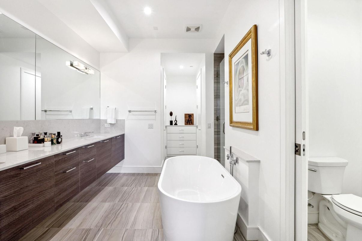 Bathroom, Dual Sink Vanities, Free Standing Baths, Interior, Recessed Lighting, Wood Texture Flooring