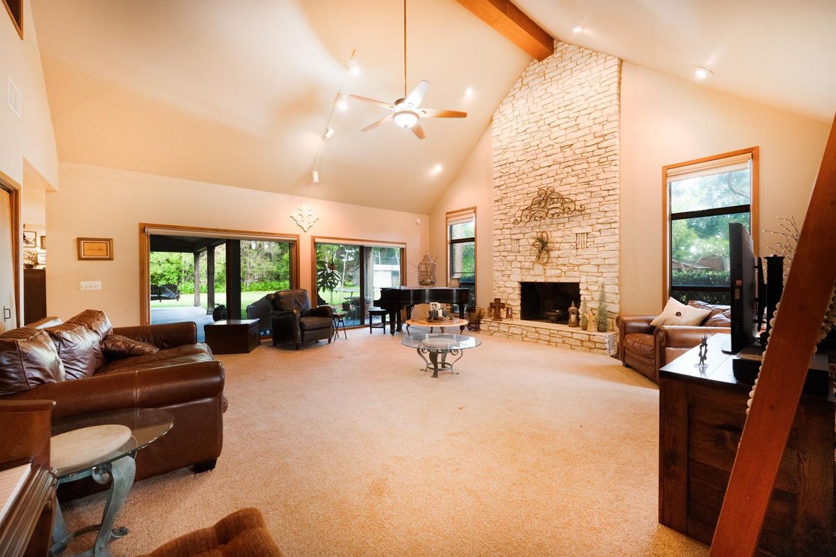 Fireplace, Interior, Living room, Piano, Recessed Lighting, Stone Walls