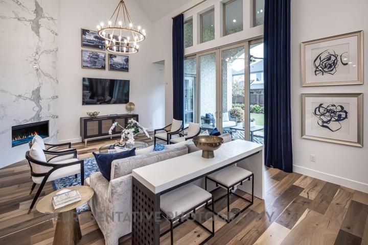 Chandelier, Dining room, Fireplace, Interior, Living room, Marble Walls, Wood Texture Flooring