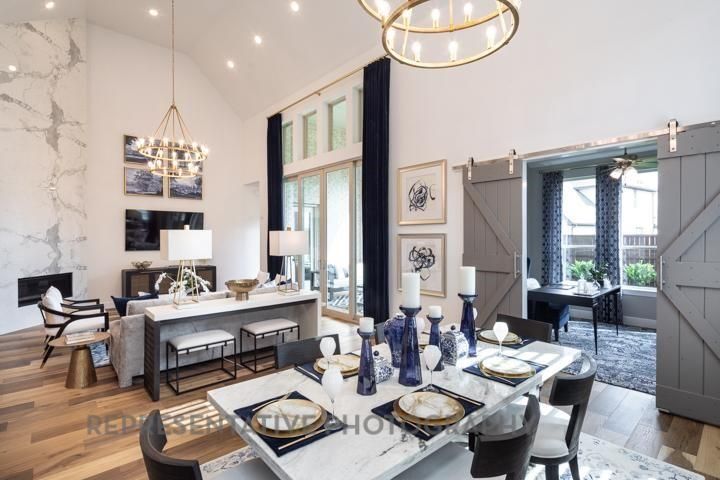 Chandelier, Dining room, Fireplace, Interior, Living room, Pendant Lights, Recessed Lighting, Wood Texture Flooring