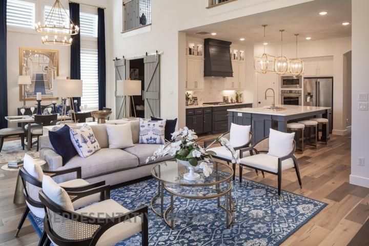 Chandelier, Dining room, Interior, Kitchen, Living room, Pendant Lights, Recessed Lighting, Stainless Steel Appliances, Wood Texture Flooring