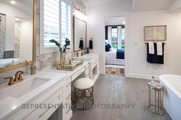 Bathroom, Dual Sink Vanities, Interior, Marble Walls, Recessed Lighting, Wood Texture Flooring