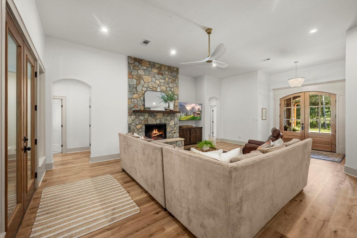 Chandelier, Fireplace, Interior, Living room, Recessed Lighting, Wood Texture Flooring