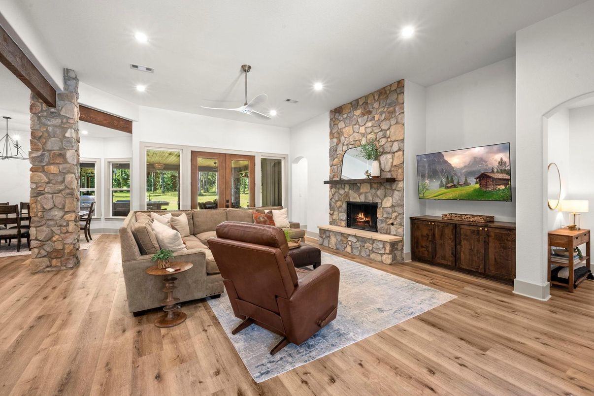 Fireplace, Interior, Living room, Recessed Lighting, Stone Walls, Wood Texture Flooring