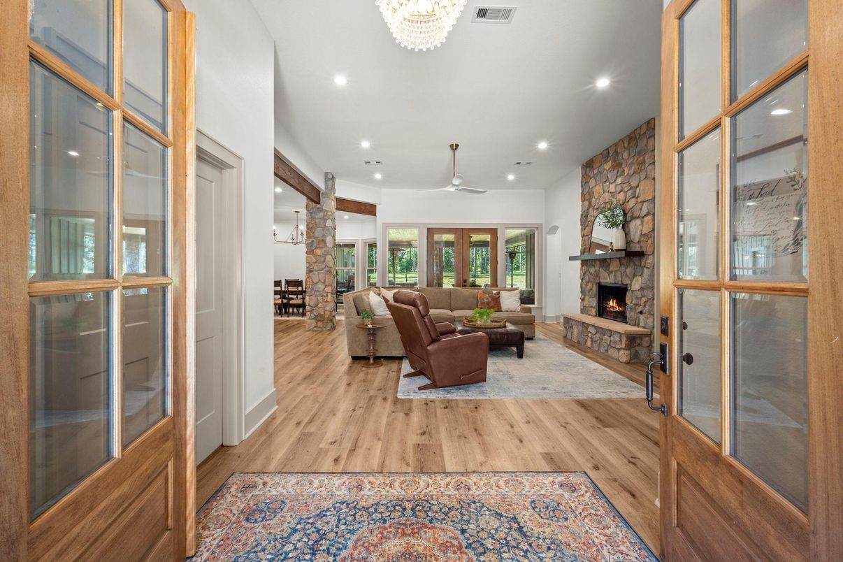 Chandelier, Fireplace, Interior, Living room, Recessed Lighting, Wood Texture Flooring