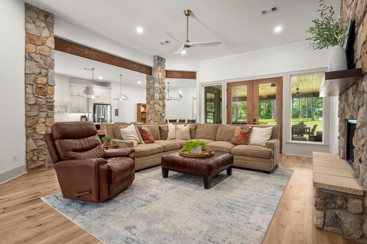 Fireplace, Interior, Kitchen, Living room, Pendant Lights, Recessed Lighting, Stone Walls, Wood Texture Flooring