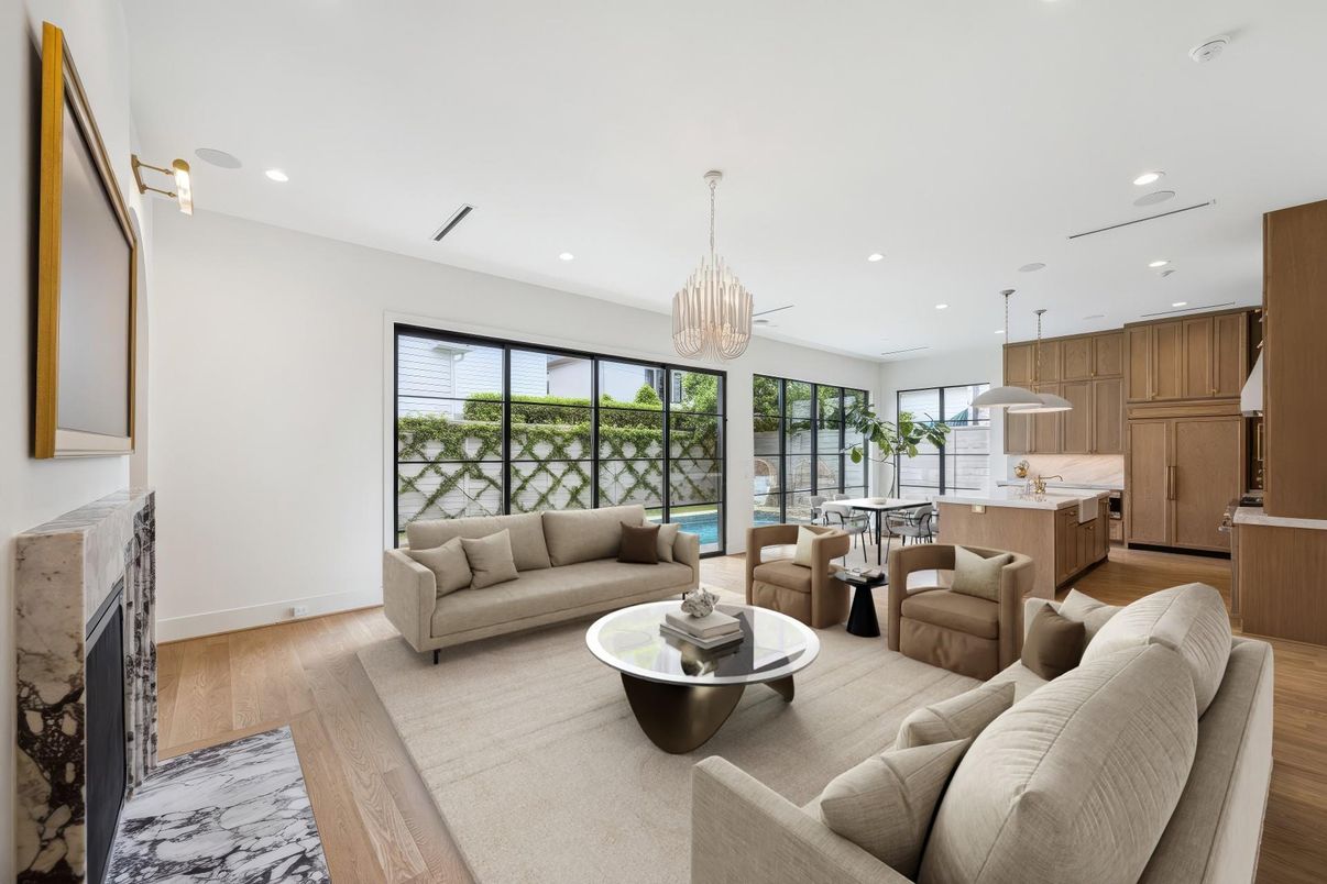 Chandelier, Dining room, Fireplace, Interior, Kitchen, Living room, Pendant Lights, Recessed Lighting, Wood Texture Flooring