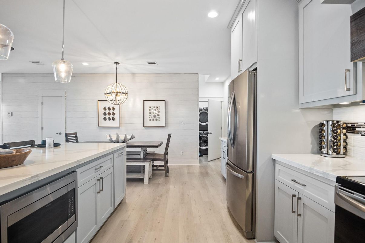 Chandelier, Dining room, Interior, Kitchen, Pendant Lights, Recessed Lighting, Stainless Steel Appliances, Wood Texture Flooring