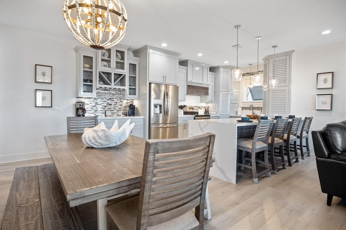 Chandelier, Dining room, Interior, Kitchen, Pendant Lights, Recessed Lighting, Stainless Steel Appliances, Wood Texture Flooring