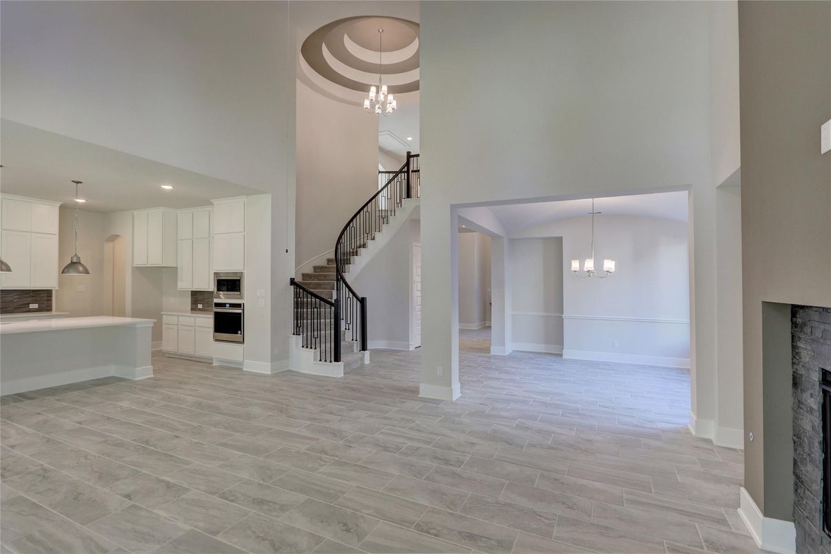 Fireplace, Interior, Kitchen, Pendant Lights, Recessed Lighting, Stainless Steel Appliances, Wood Texture Flooring