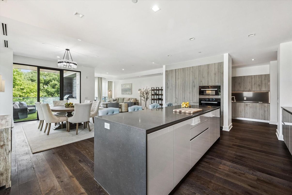 Chandelier, Dining room, Interior, Kitchen, Pendant Lights, Recessed Lighting, Stainless Steel Appliances, Wood Texture Flooring