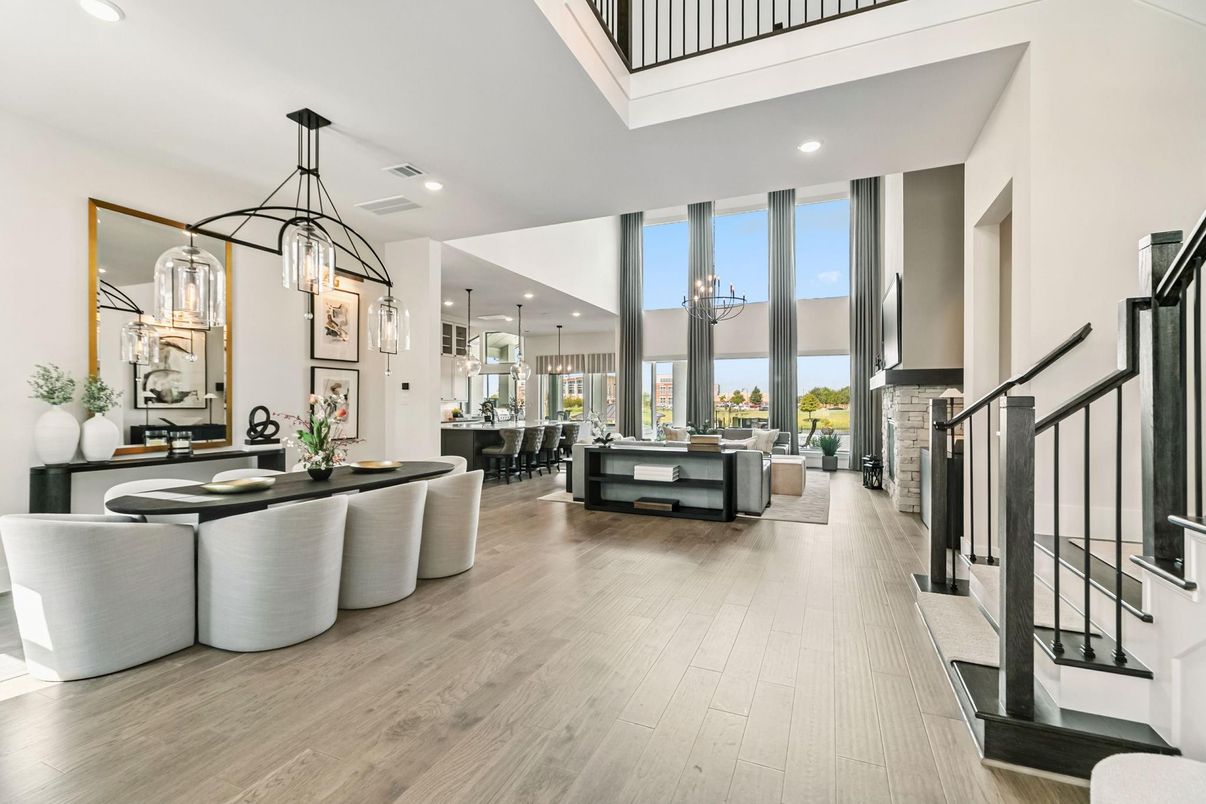 Chandelier, Dining room, Fireplace, Interior, Living room, Pendant Lights, Recessed Lighting, Wood Texture Flooring