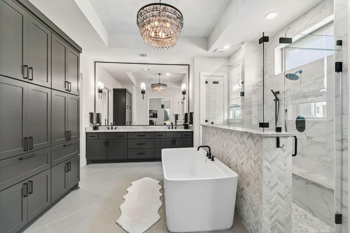 Bathroom, Chandelier, Dual Sink Vanities, Free Standing Baths, Glass Shower, Interior, Marble Walls, Recessed Lighting