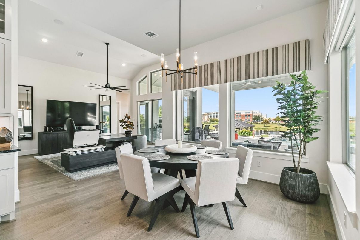 Dining room, Fireplace, Interior, Living room, Pendant Lights, Recessed Lighting, Wood Texture Flooring