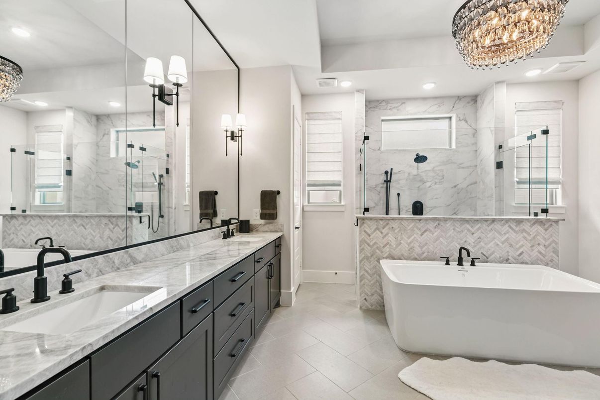 Bathroom, Chandelier, Dual Sink Vanities, Free Standing Baths, Glass Shower, Interior, Marble Walls, Recessed Lighting