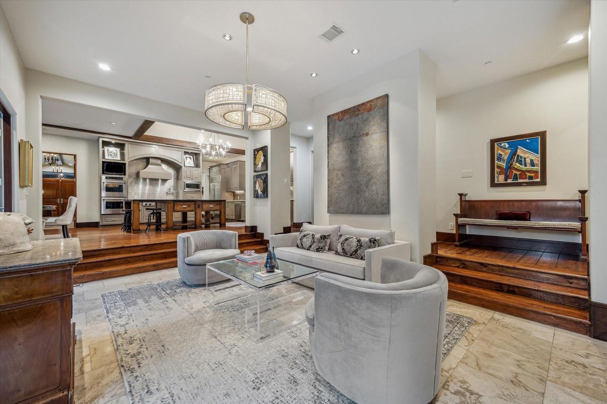 Chandelier, Interior, Kitchen, Living room, Pendant Lights, Recessed Lighting, Stainless Steel Appliances, Wood Texture Flooring