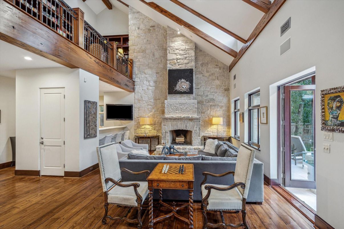 Dining room, Fireplace, Interior, Living room, Recessed Lighting, Stone Walls, Wooden Beams, Wood Texture Flooring