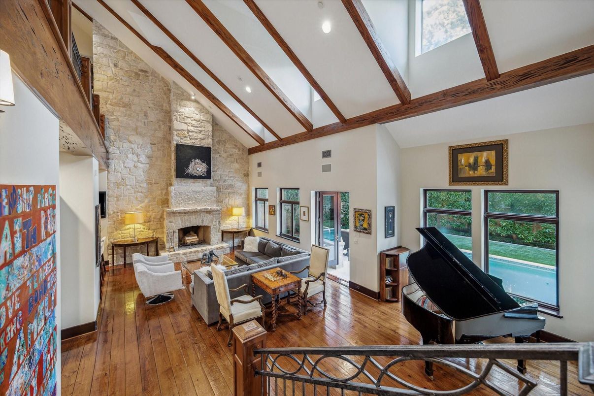 Fireplace, Interior, Living room, Piano, Recessed Lighting, Stone Walls, Wooden Beams, Wood Texture Flooring