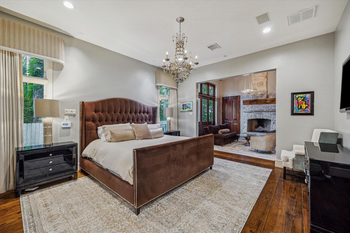 Bedroom, Chandelier, Fireplace, Interior, Recessed Lighting, Wood Texture Flooring