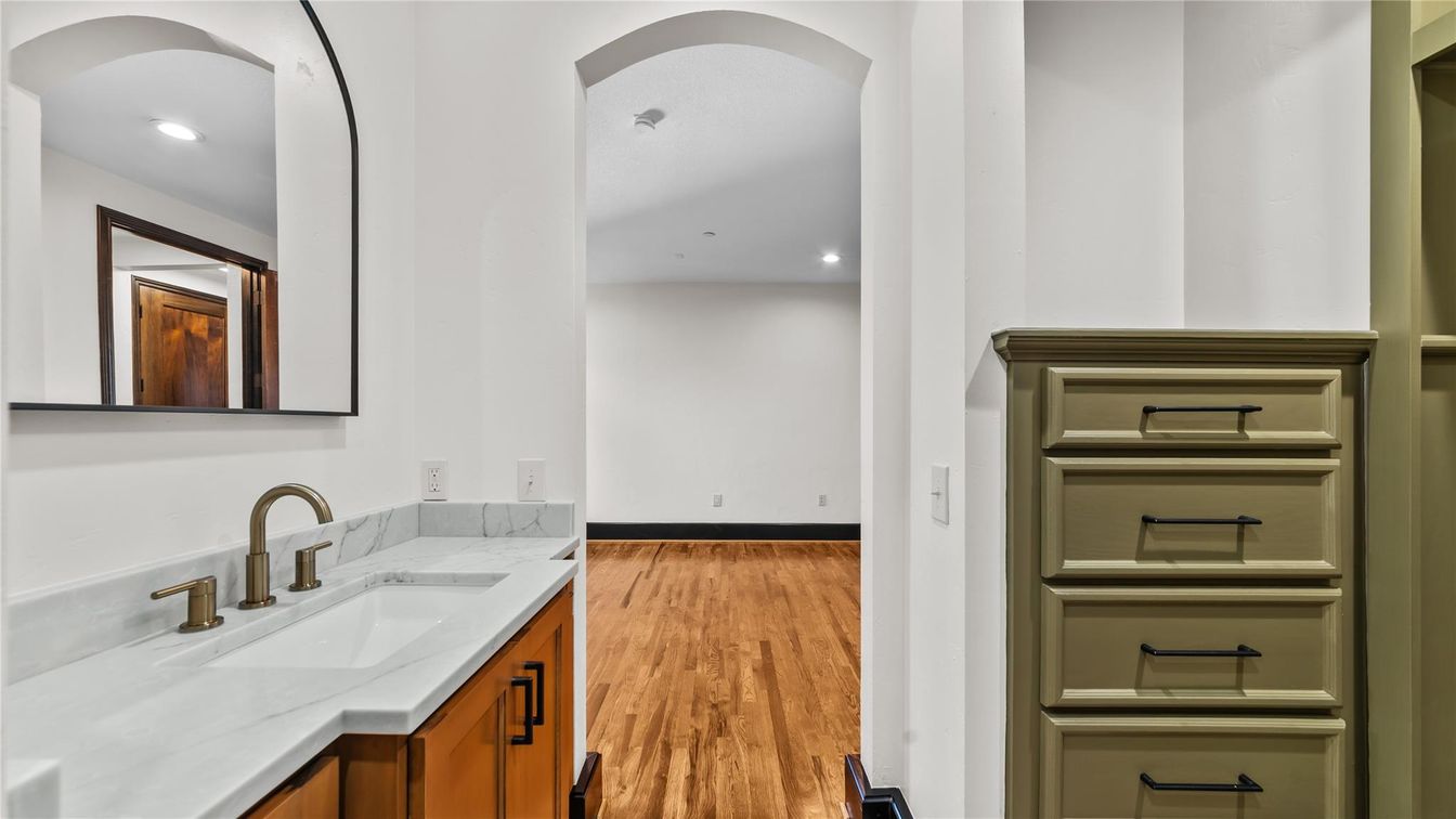 Bathroom, Dual Sink Vanities, Interior, Recessed Lighting, Wood Texture Flooring