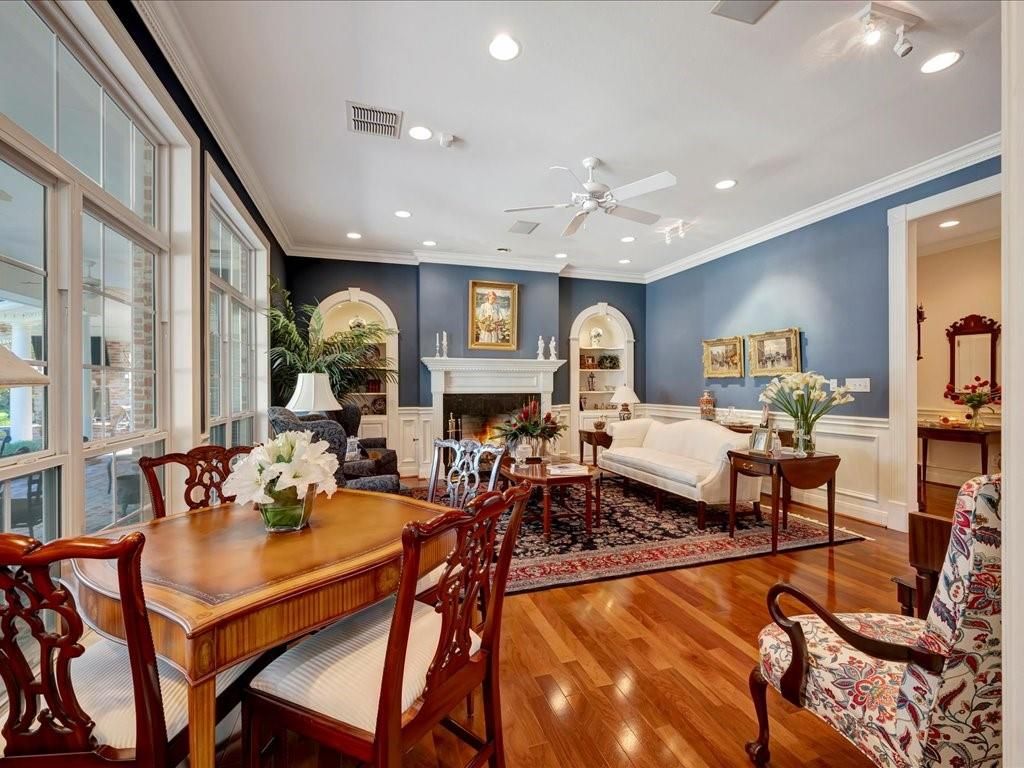 Dining room, Fireplace, Interior, Living room, Recessed Lighting, Wood Texture Flooring