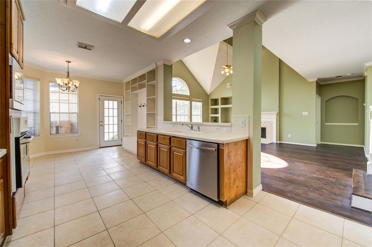 Chandelier, Fireplace, Interior, Kitchen, Recessed Lighting, Wood Texture Flooring