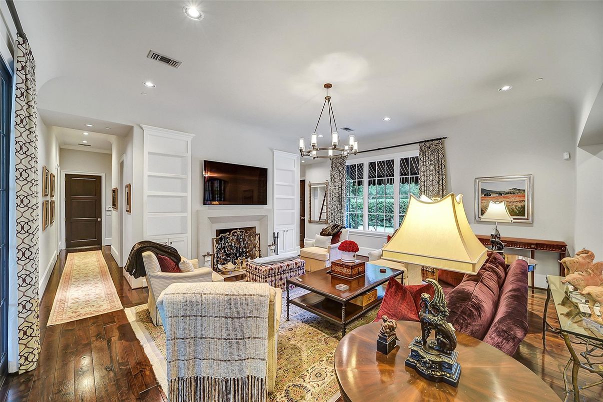 Chandelier, Fireplace, Interior, Living room, Pendant Lights, Recessed Lighting, Wood Texture Flooring