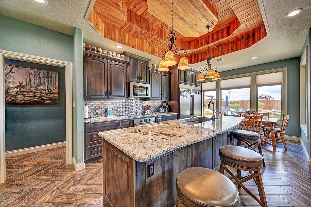 Dining room, Interior, Kitchen, Pendant Lights, Recessed Lighting, Stainless Steel Appliances, Wooden Ceilings, Wood Texture Flooring