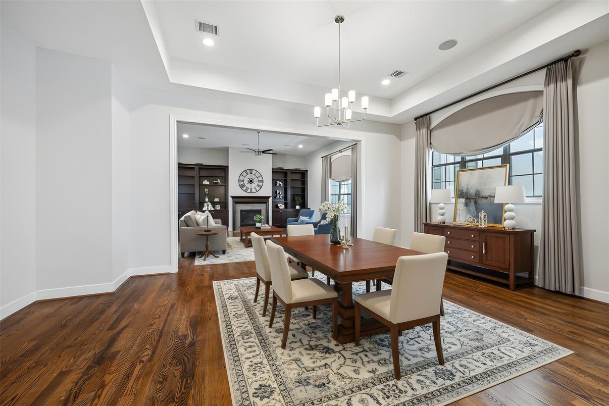 Dining room, Fireplace, Interior, Living room, Pendant Lights, Recessed Lighting, Wood Texture Flooring