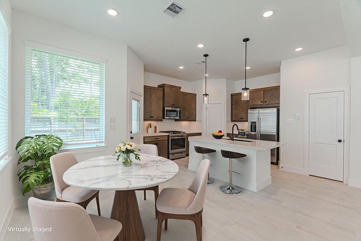 Dining room, Interior, Kitchen, Pendant Lights, Recessed Lighting, Stainless Steel Appliances, Wood Texture Flooring
