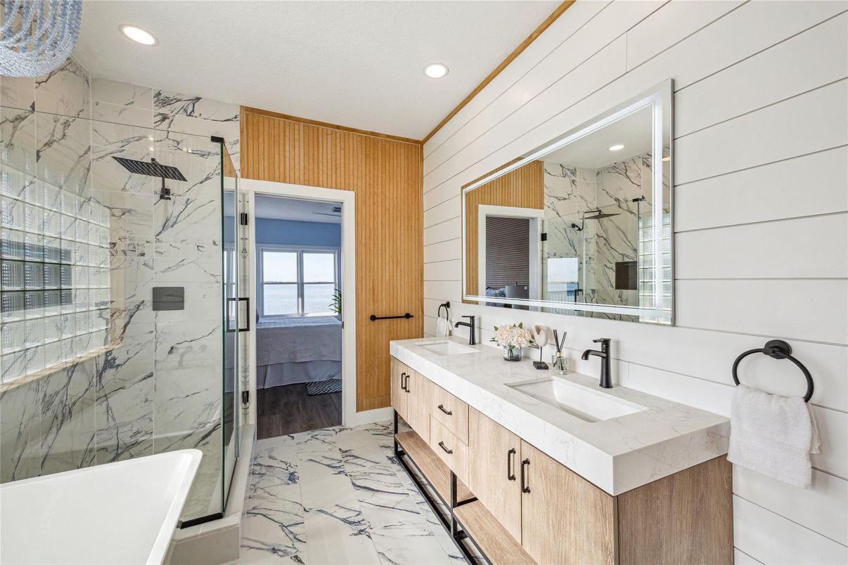 Bathroom, Dual Sink Vanities, Free Standing Baths, Glass Shower, Interior, Marble, Marble Walls, Recessed Lighting