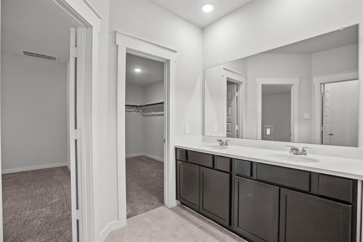 Bathroom, Dual Sink Vanities, Interior, Recessed Lighting, Walk-in Closets