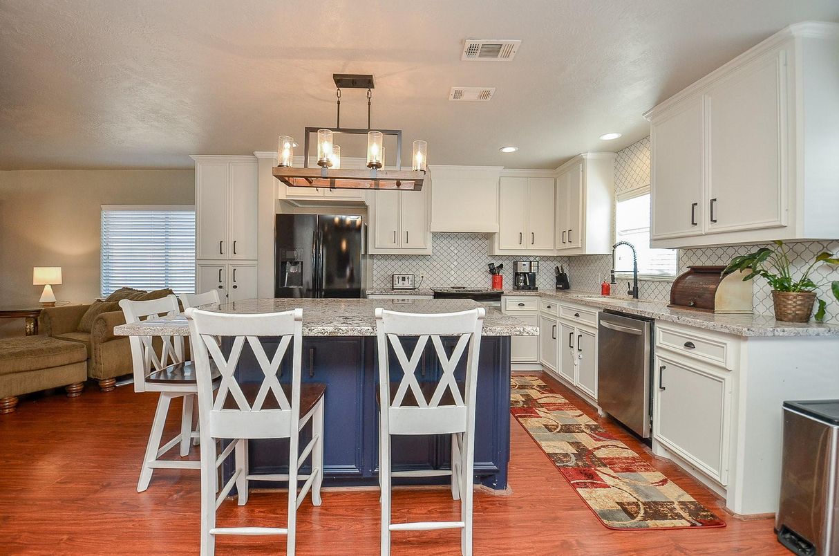 Chandelier, Interior, Kitchen, Pendant Lights, Recessed Lighting, Stainless Steel Appliances, Wood Texture Flooring