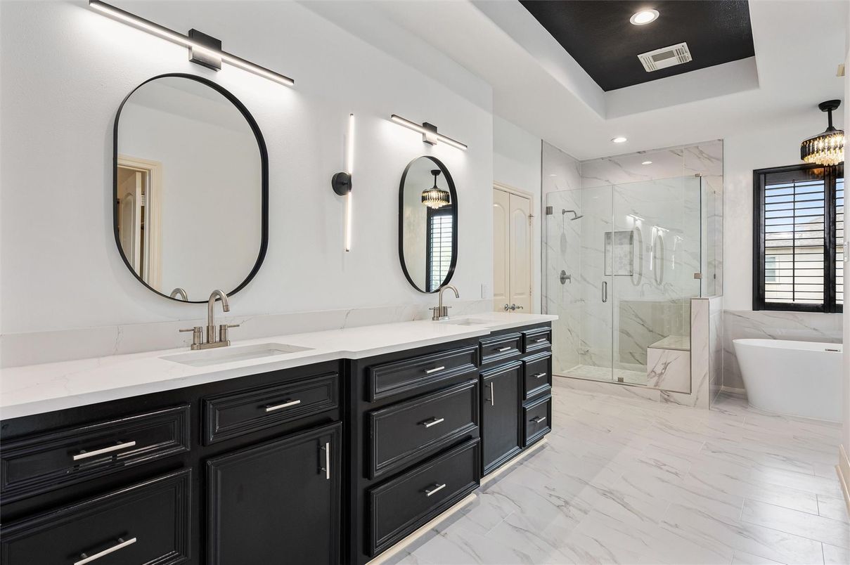 Bathroom, Dual Sink Vanities, Free Standing Baths, Glass Shower, Interior, Marble, Marble Walls, Pendant Lights, Recessed Lighting