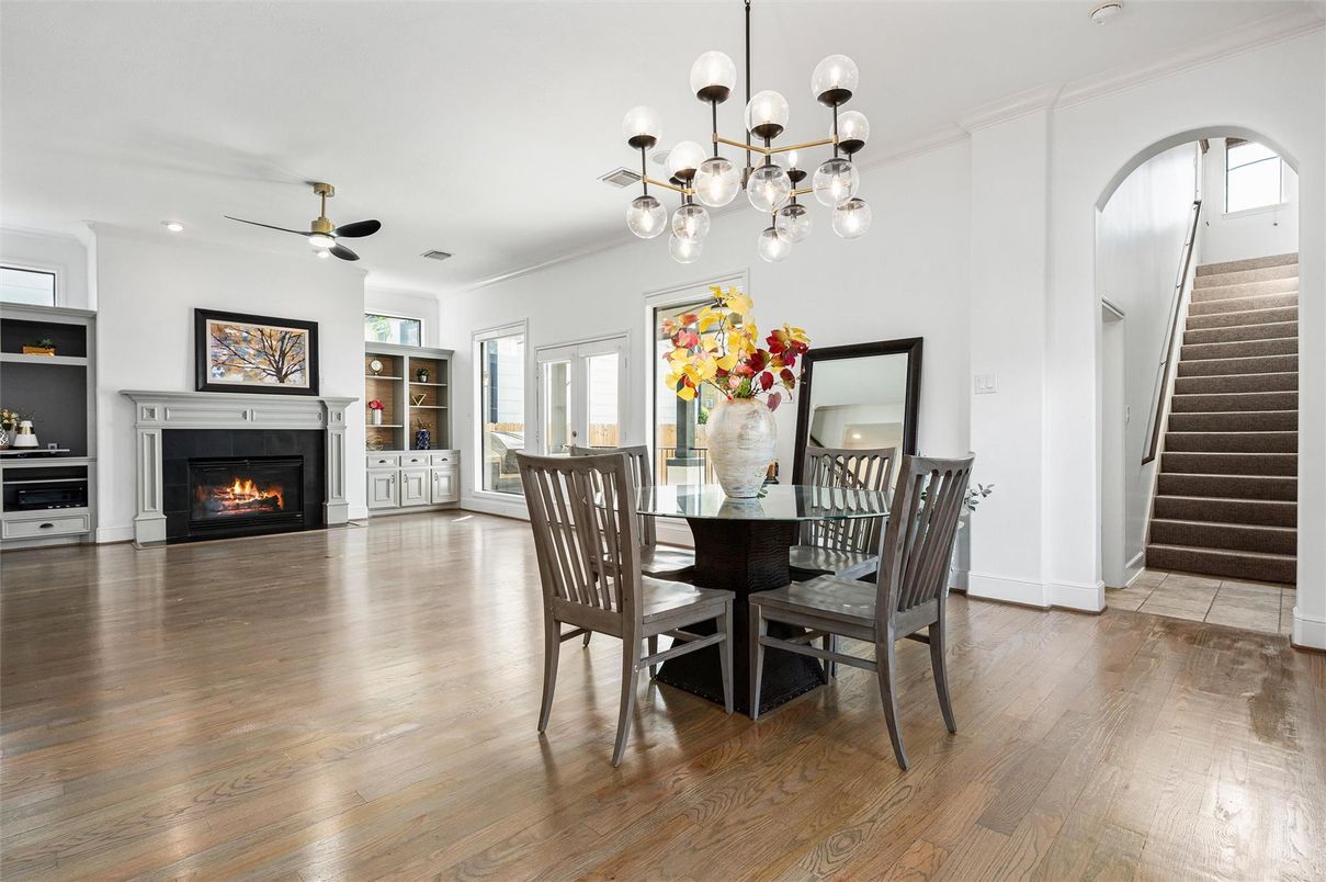 Dining room, Fireplace, Interior, Pendant Lights, Recessed Lighting, Wood Texture Flooring
