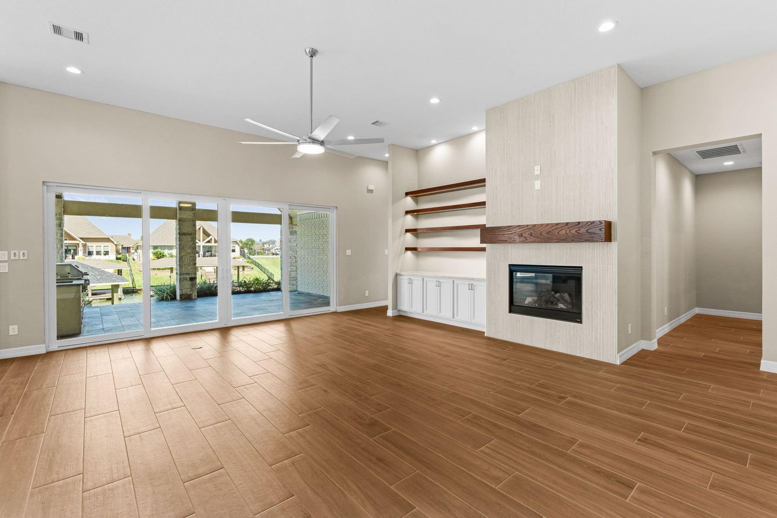 Empty room, Fireplace, Interior, Recessed Lighting, Wood Texture Flooring