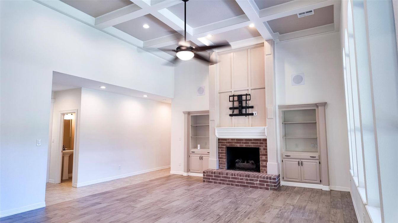 Empty room, Fireplace, Interior, Recessed Lighting, Wood Texture Flooring