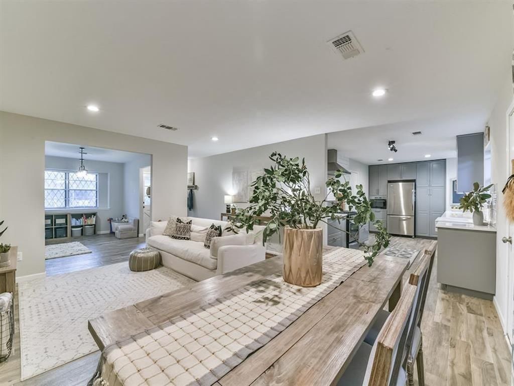 Dining room, Interior, Kitchen, Living room, Pendant Lights, Recessed Lighting, Stainless Steel Appliances, Wood Texture Flooring